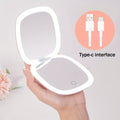 Two-Sided Magnifying Mirror with LED Lights, Featuring Three Brightness Levels, USB Charging, a Foldable And Portable Design, a Polished Plastic Frame, And an Animal Theme, Ideal for Makeup And Travel
