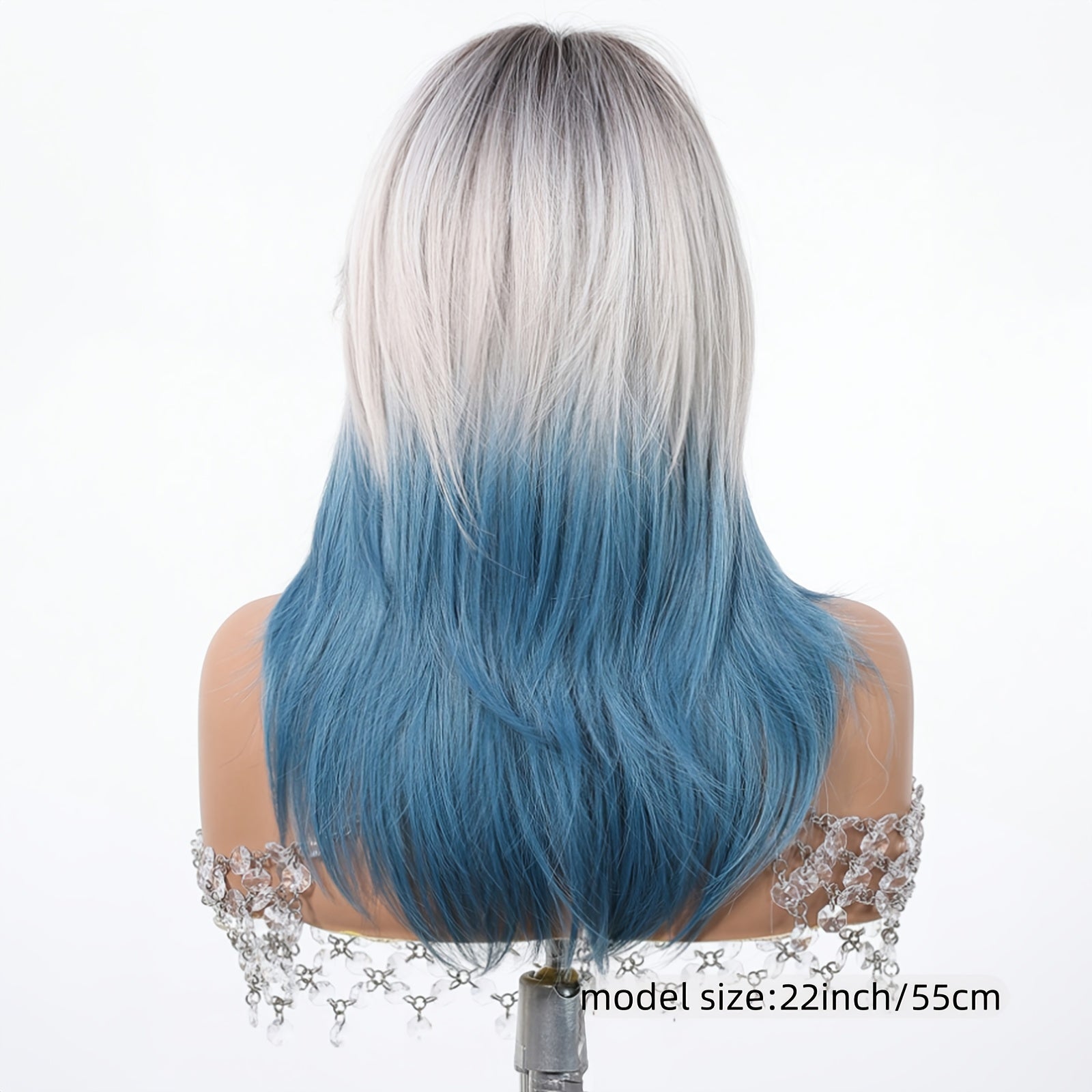 A 22-Inch Stylish Wig for Women Featuring a Beautiful Gradient Blue Color with Bangs And Layers, Made from Synthetic Fibers. It Comes with a Rose Hair Net And Can Withstand High Temperatures, Making It Perfect for Cosplay, Parties, Travel, Weddings