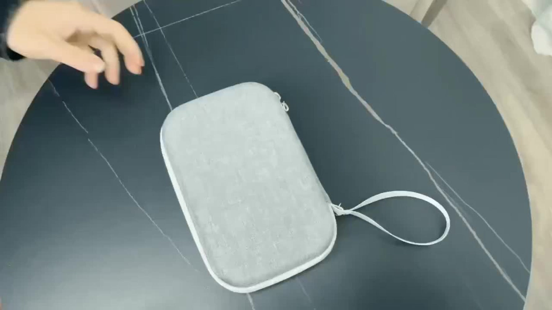 A Gray Hard Shell Storage Bag Made of EVA, Featuring Pockets And Multiple Compartments, Perfect for Travel And for home Use, Designed for Handheld Nebulizers, Humidifiers, Facial Steamers, And Pore Vacuum Cleaners