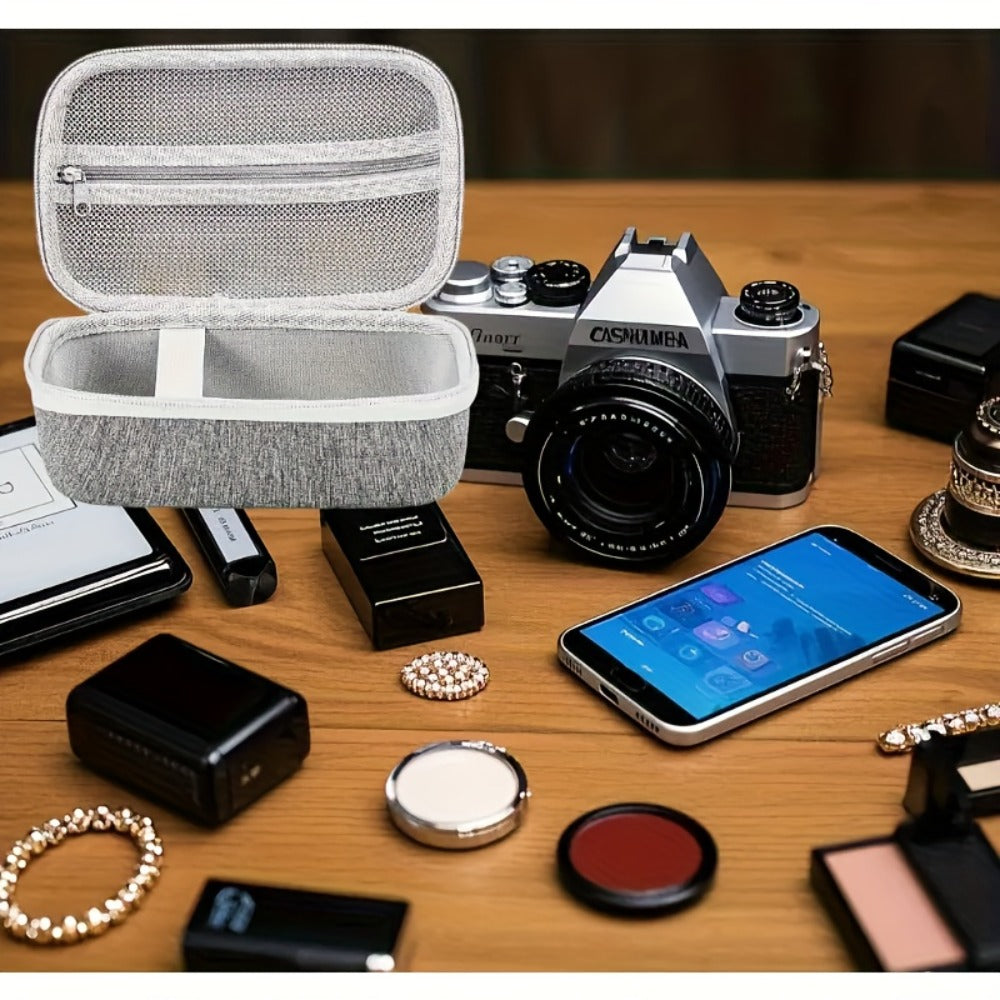 A Gray Hard Shell Storage Bag Made of EVA, Featuring Pockets And Multiple Compartments, Perfect for Travel And for home Use, Designed for Handheld Nebulizers, Humidifiers, Facial Steamers, And Pore Vacuum Cleaners